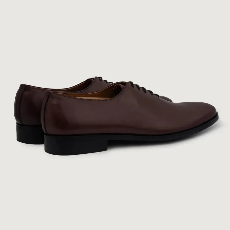 Director Wholecut Maroon Leather Shoes
